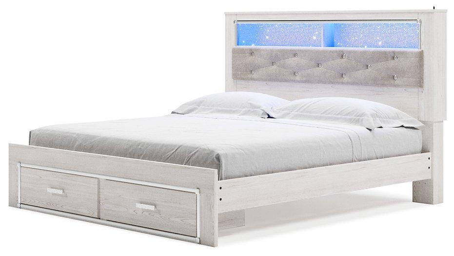 Altyra White King Upholstered Bookcase Bed with Storage